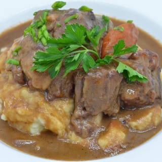 SOUTHERN SMOTHERED OXTAILS